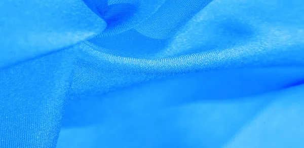 Texture, background, pattern, silk fabric in blue. This silk is — Stock Photo, Image