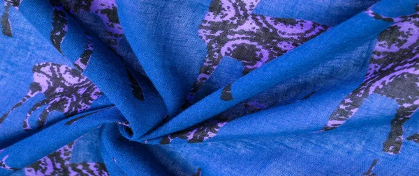 Текстура, фон, хлопчатобумажная ткань голубого цвета с печатью — стоковое фото