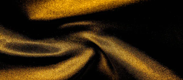 Textúra, háttér, mintázat. aranysárga selyem szövet panorami — Stock Fotó