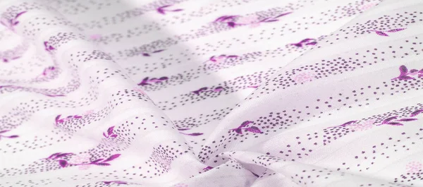 Doku arka planı, kadın şal. beyaz bir bac sarı çiçekler