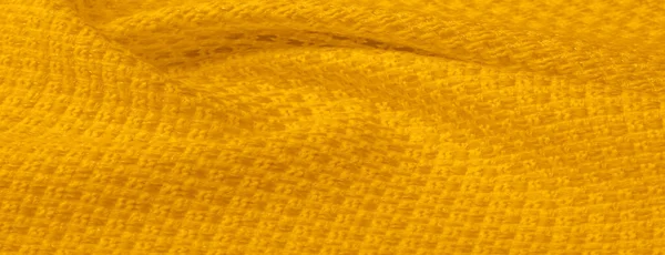 Textura de fundo, padrão. Tecido amarelo com lantejoulas metálicas — Fotografia de Stock