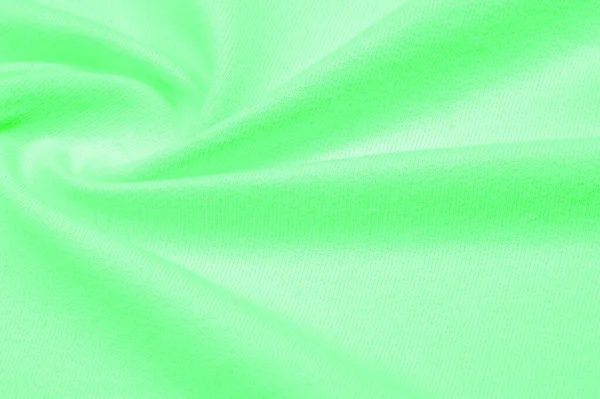 Textura, pozadí, vzorek. Pletená textilie zelená. zelený trávník — Stock fotografie
