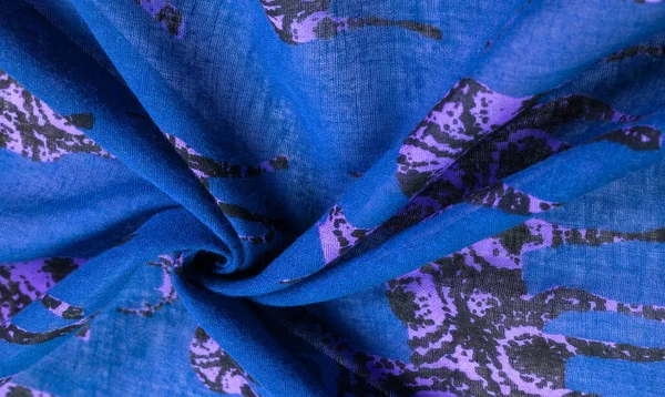 Textuur, achtergrond, katoenweefsel van blauwe kleur met een print van — Stockfoto