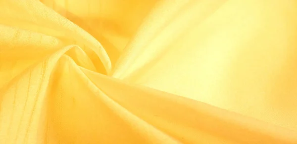Textura de fondo, patrón. tela de seda amarilla. De Telio, esto... — Foto de Stock
