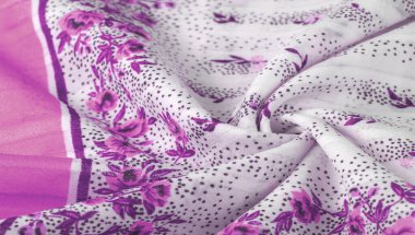 Doku arka planı, kadın şal. beyaz bir bac sarı çiçekler