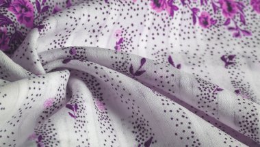 Doku arka planı, kadın şal. beyaz bir bac sarı çiçekler