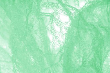 Örgü yeşilli kumaş. Sizin için ruhani parlaklık bir çizgi ekleyin