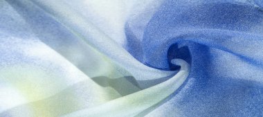 soluk mavi ipek kumaş, sarı ve beyaz, soyut desen ve