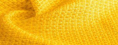 Arka plan dokusu, desen. Metalik payetler ile sarı kumaş