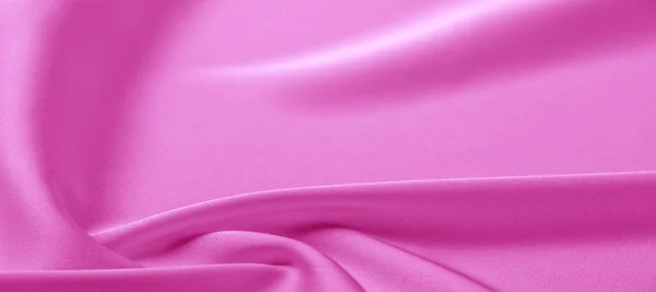 Tekstur. Kain sutra merah muda. kilau brilian dan karakteristik — Stok Foto