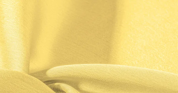 Background, pattern, texture, wallpaper, yellow silk fabric. It