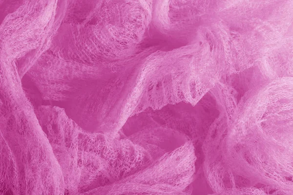 Fabric in a mesh of pink color. this is a micro-thin mesh, which