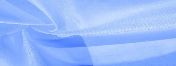 Текстура, фон, візерунок, шовкова синя тканина. Креп сатин на т — стокове фото