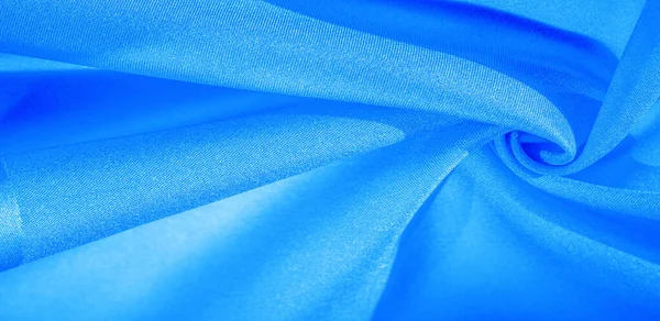 Textuur, achtergrond, patroon, zijde stof in blauw. Deze zijde is — Stockfoto