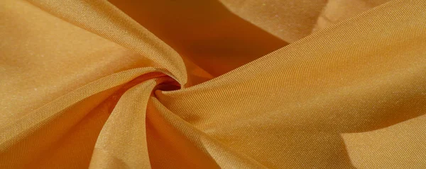 Tissu en soie jaune ECE / SAE ambre. La photo est destinée à , — Photo