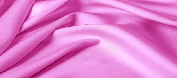 Texture. Pink silk fabric. brilliant luster and characteristic — Stock Photo, Image