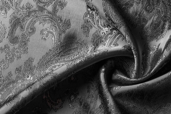 Textura, fondo, tela gris acero negro con un paisley patt — Foto de Stock