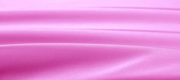 Consistenza. Tessuto di seta rosa. brillante lucentezza e caratteristica — Foto Stock