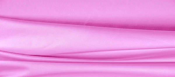 Текстура. Розовая шелковая ткань. блестящий блеск и характеристика — стоковое фото