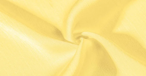 Фон, візерунок, текстура, шпалери, жовта шовкова тканина. Це — стокове фото