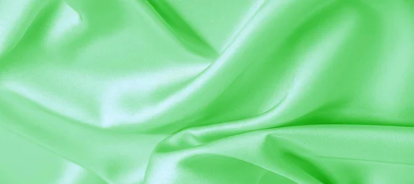 Текстура тла, візерунок. Зелена смарагдова шовкова тканина. Ця пустеля — стокове фото