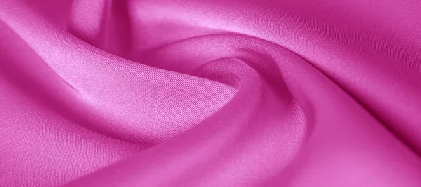 Textura. Tecido de seda rosa. brilho brilhante e característica — Fotografia de Stock