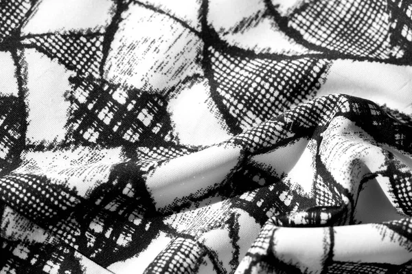 Texturu, pozadí, vzorek. bílá tkanina s černým abstraktním f — Stock fotografie