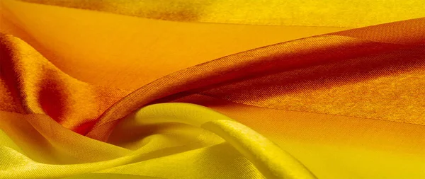 Textura, fondo, tela a rayas de seda amarilla con un — Foto de Stock