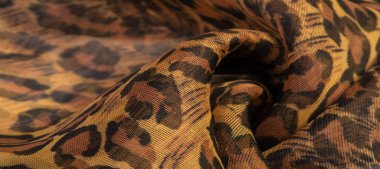 doku, ipek kumaş, leopar deri, kahverengi-sarı siyah tonları,