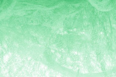 Örgü yeşilli kumaş. Sizin için ruhani parlaklık bir çizgi ekleyin