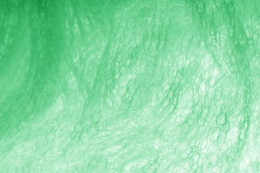 Örgü yeşilli kumaş. Sizin için ruhani parlaklık bir çizgi ekleyin