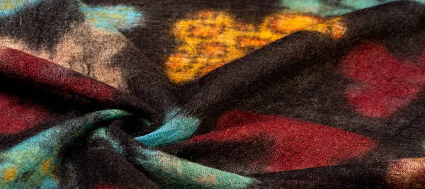 Текстура, фон, шерстяная ткань в черном цвете с разноцветным маслом — стоковое фото