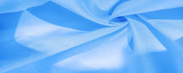 Textur, bakgrund, mönster, solid ljusblå siden satin tyg — Stockfoto