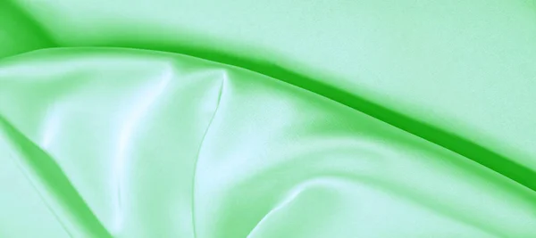 Hintergrund Textur, Muster. grüne smaragdgrüne Seide. dieses Jahr — Stockfoto