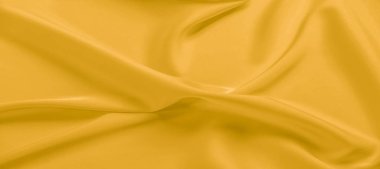 arka plan dokusu, desen. Sarı ipek kumaş. Çok hafif bir fa