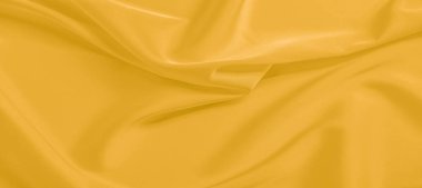 arka plan dokusu, desen. Sarı ipek kumaş. Çok hafif bir fa