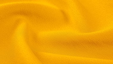 sarı doku ile bebek bezi. Bu çok yönlü kumaşın birçok kullanımı vardır,