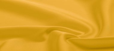 arka plan dokusu, desen. Sarı ipek kumaş. Çok hafif bir fa