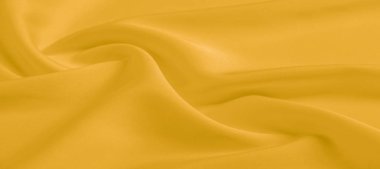 arka plan dokusu, desen. Sarı ipek kumaş. Çok hafif bir fa