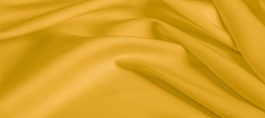 arka plan dokusu, desen. Sarı ipek kumaş. Çok hafif bir fa