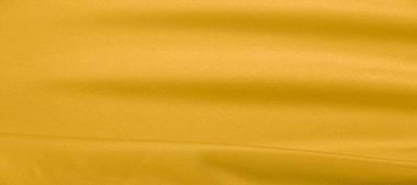 arka plan dokusu, desen. Sarı ipek kumaş. Çok hafif bir fa