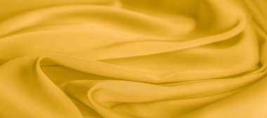 arka plan dokusu, desen. Sarı ipek kumaş. Çok hafif bir fa