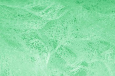 Örgü yeşilli kumaş. Sizin için ruhani parlaklık bir çizgi ekleyin