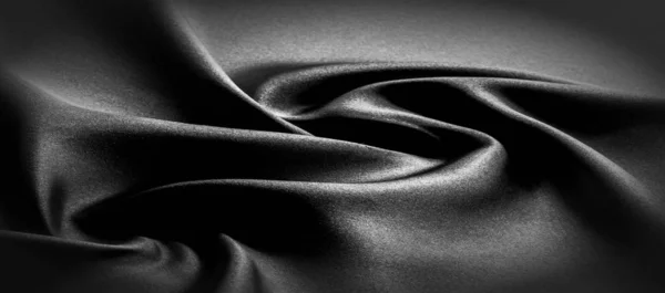 Текстура, фон, візерунок. Чорна шовкова тканина. Він чорний і — стокове фото