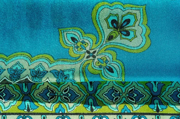 Текстура, фон, різнокольорова шовкова тканина з візерунком — стокове фото