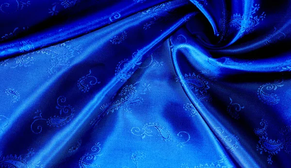 Tekstur, latar belakang, pola kain sutra biru chiffon dengan pai — Stok Foto