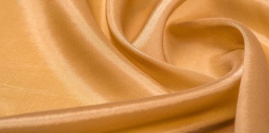 Şekil, arka plan, desen. Açık kahverengi ipek kumaş. Bu th