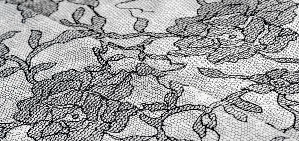 Текстура, фон, візерунок. Шовкова біла тканина з мереживним візерунком — стокове фото