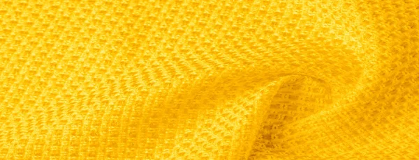 Struttura dello sfondo, motivo. Tessuto giallo con paillettes metalliche — Foto Stock