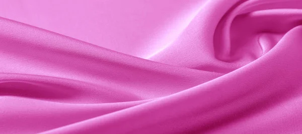 Textura. Tejido de seda rosa. brillo brillante y característica — Foto de Stock